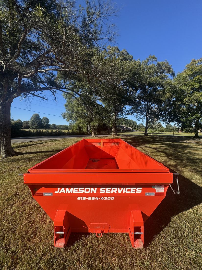 Empty Jameson Services dumpster showing available space